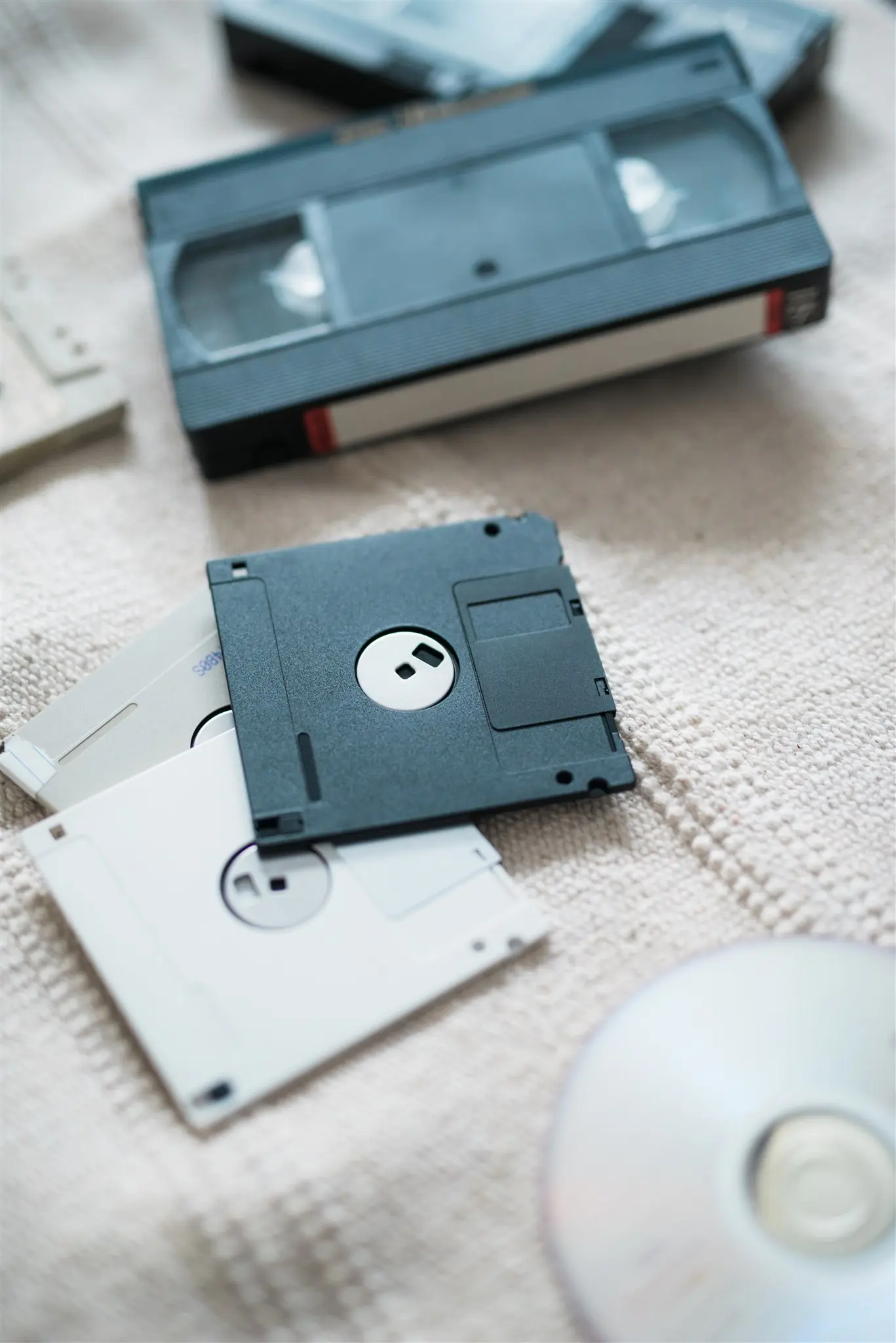 VHS tape, floppy disks and a CD — analog media ready for digitalization in Zagreb