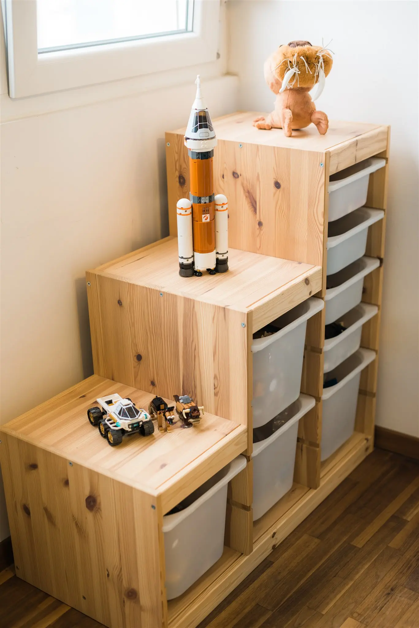 Low open shelves with toys within a child’s reach — kids’ room organization in Zagreb