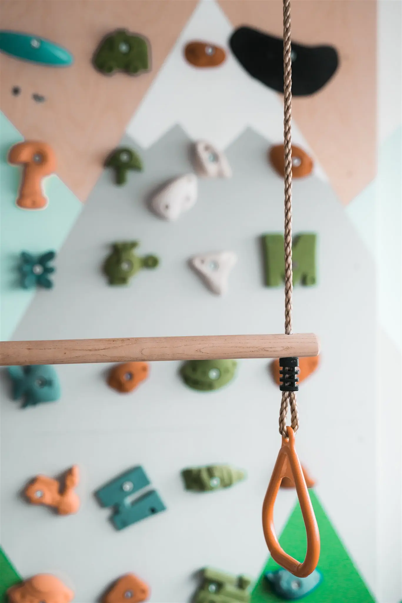 Climbing wall with handholds in a child’s room — a space arranged at the child’s height, Zagreb