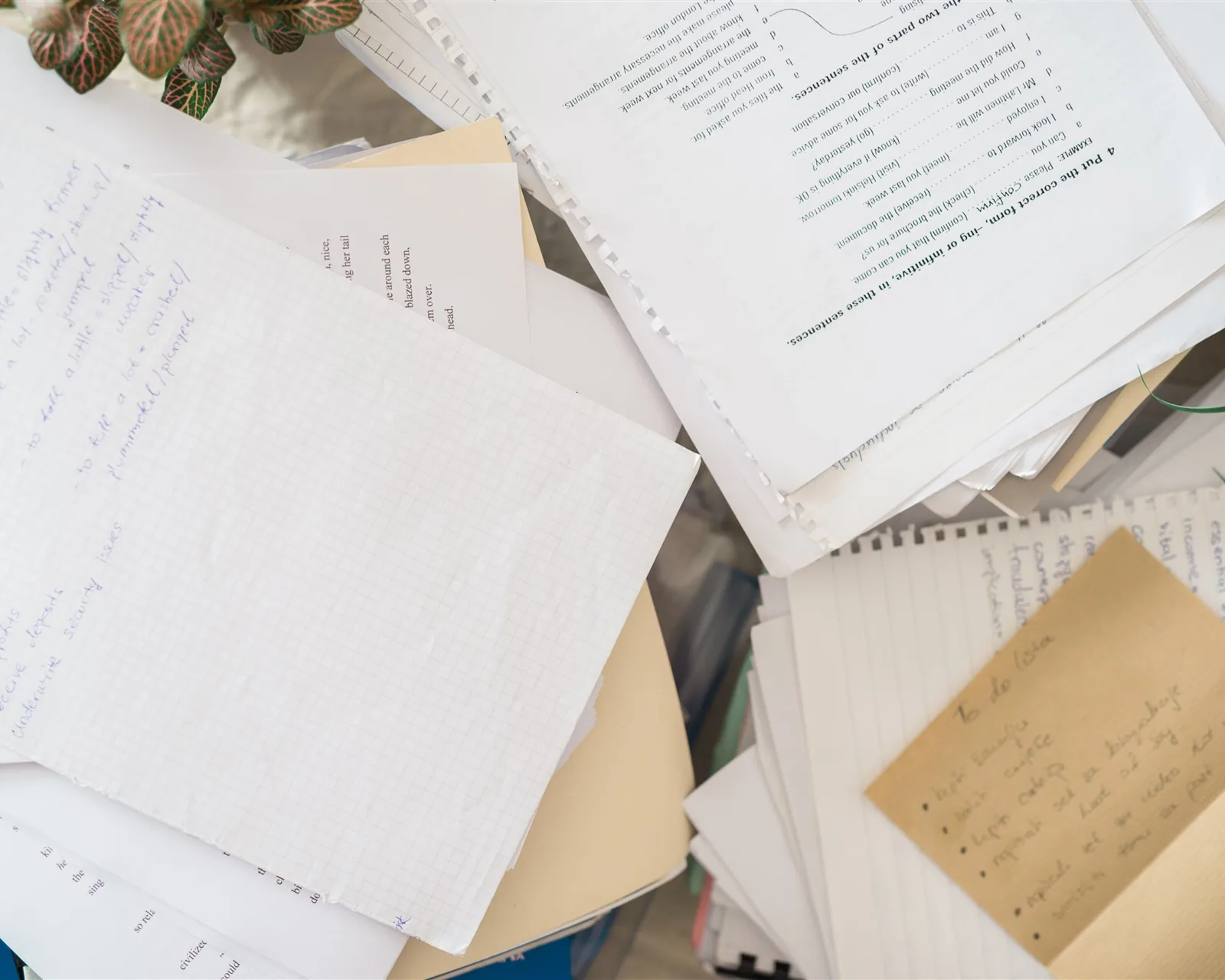 A pile of papers, handwritten notes and documents — papers, the third KonMari® category